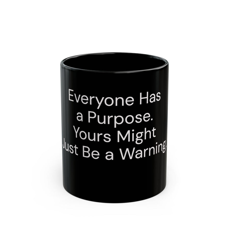 Everyone Has a Purpose, Yours Might Just Be a Warning black coffee mug, 11oz, front view